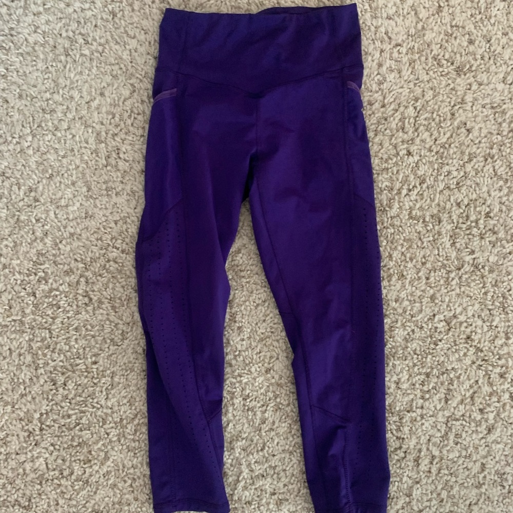 Purple leggings.